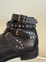 Yves Saint Laurent Ranger Stud Boot with wrap straps in size 37.5, showcasing the stylish black leather shoes with stud details.
