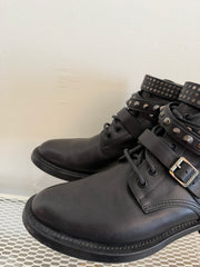Yves Saint Laurent Ranger Stud Boot with wrap straps in size 37.5, showcasing black leather shoes with studded detailing.