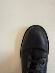 Valentino Rock Stud Combat Boots in size 38.5, featuring studded design and rugged combat style, photographed from front angle.
