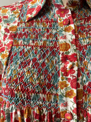 Loretta Caponi floral blouse in size small featuring delicate floral embroidery and lightweight fabric, perfect for elegant casual wear.