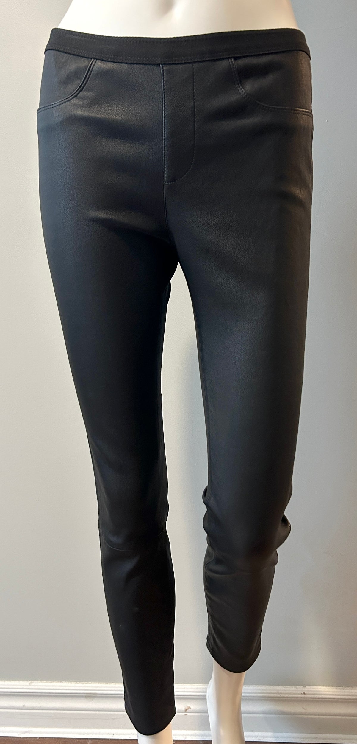 Helmut Lang lamb leather pants in size 2, black high-waisted clothing with sleek, fitted design and smooth leather texture.