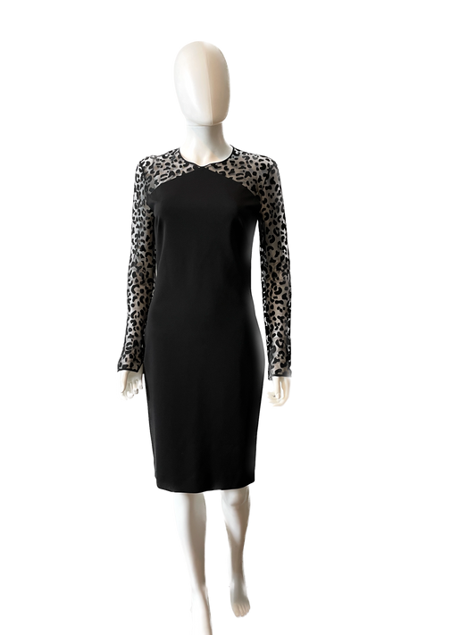 Stella McCartney mini dress in size IT44/US6, stylishly designed, displayed on a hanger with elegant fabric details.