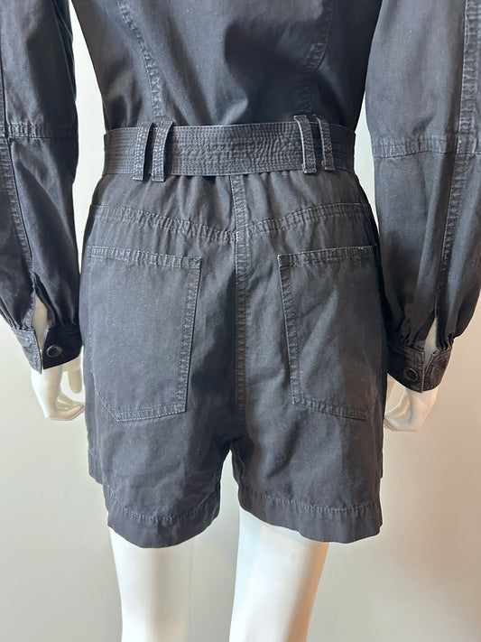 Black denim romper by Ulla Johnson, size 2, shown on a hanger with details of the sleeveless design and fit.