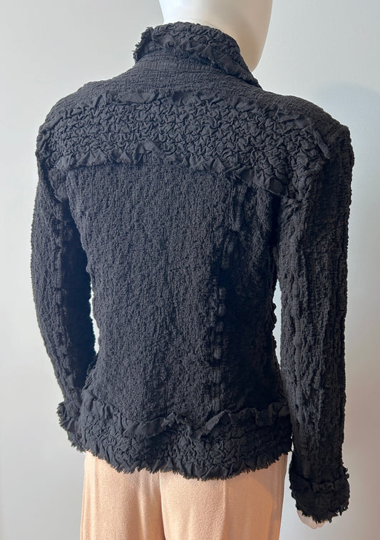 Issey Miyake women's blazer size 6, tailored clothing in a sleek design, displayed on a hanger against a neutral background.