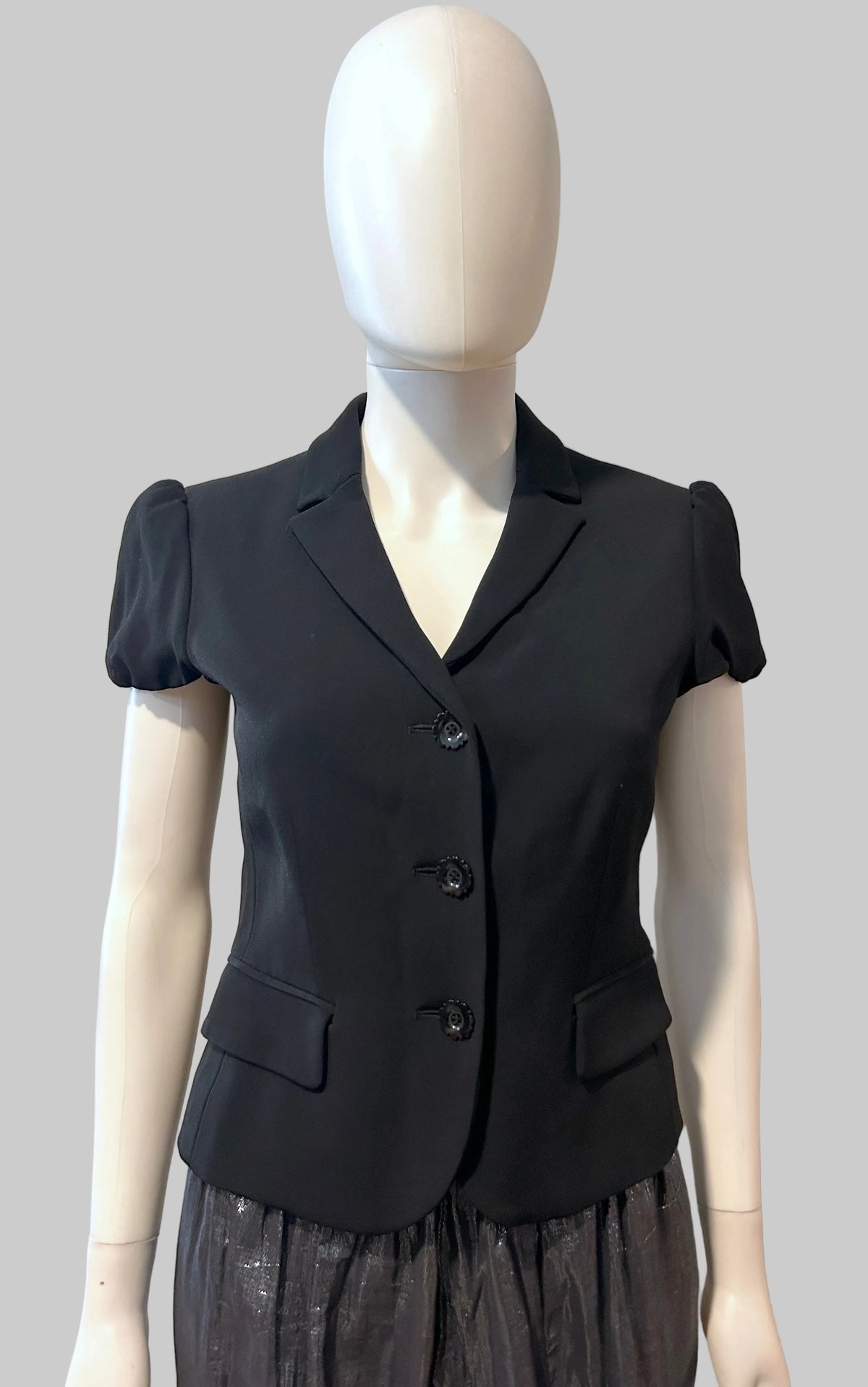 Moschino Cheap and Chic blazer in size 8, tailored women's clothing with a stylish, fitted design and classic lapel collar.