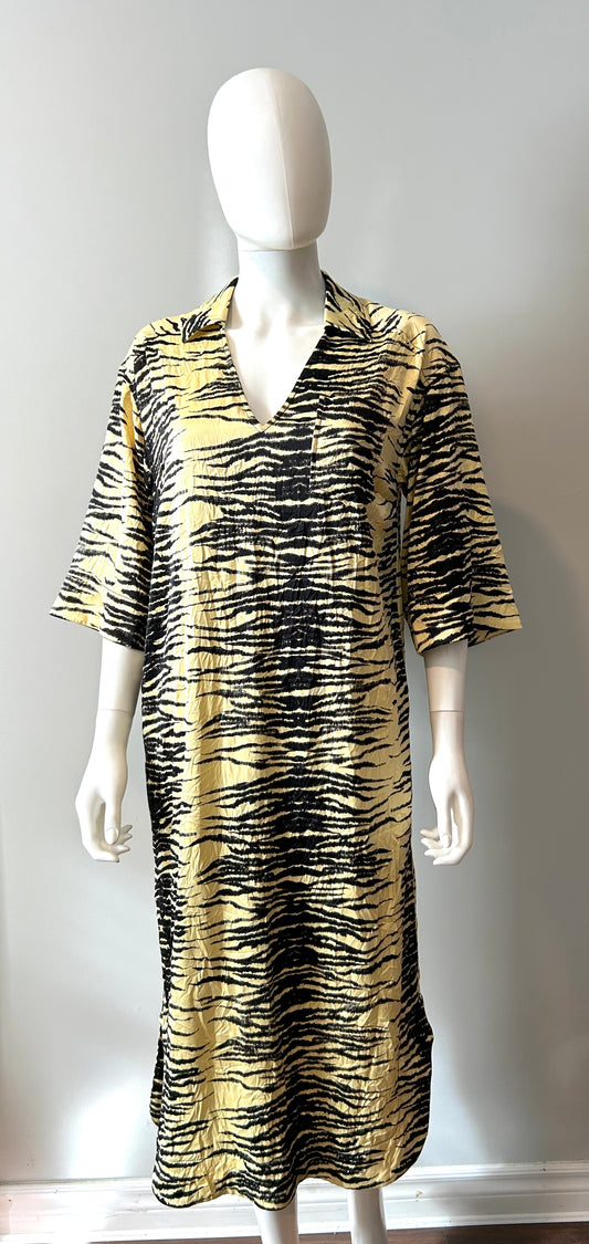 Ganni yellow and black crinkle dress in size XS, showing a stylish sleeveless design with a relaxed fit and vibrant pattern.