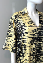 Ganni yellow and black crinkle dress in size XS, stylish casual clothing with vibrant color and textured fabric.
