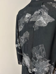 Raquel Allegra XL graphic print dress featuring bold patterns and flowing fabric, perfect for stylish casual wear.