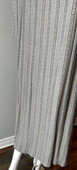Raquel Allegra grey stripe duster dress in size XS hanging on a clothing rack, showcasing its relaxed fit and stylish design.