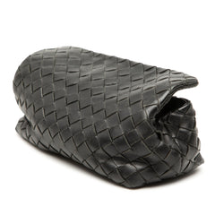 Black Bottega Veneta Intrecciato flap pouch bag with woven leather design and sleek flap closure.