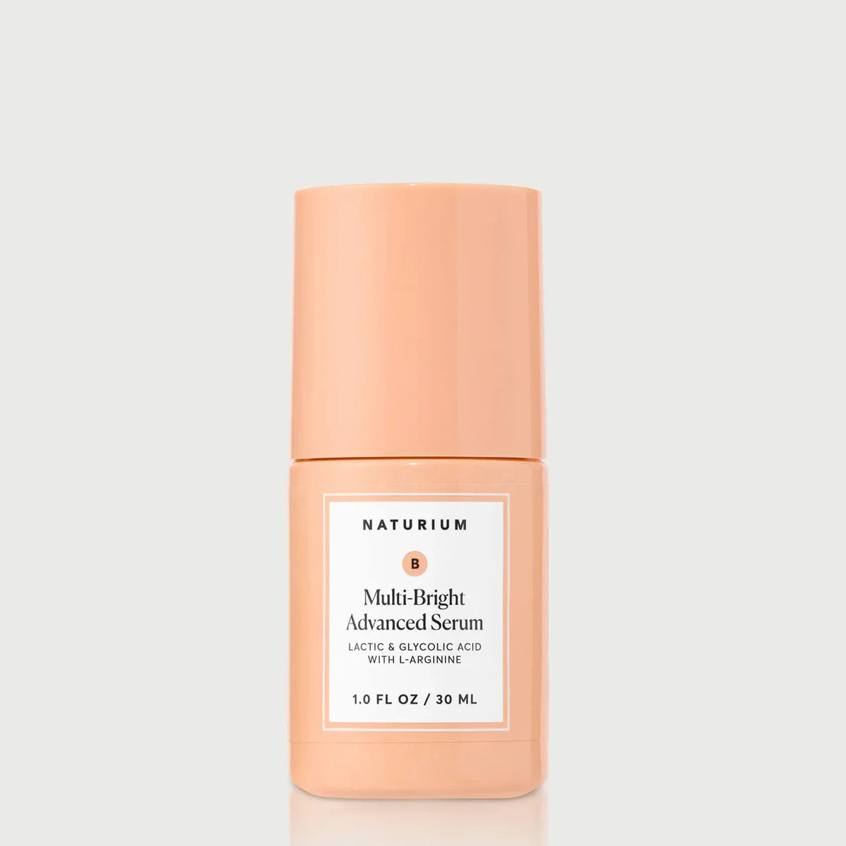 Naturium Multi-Bright Advanced Serum 30ml bottle with a pump dispenser, front view against a neutral background.