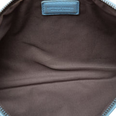Small Bottega Veneta Nappa Intrecciato zip pouch in blue, stylish leather bag with woven design and compact size.