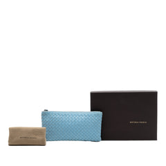 Bottega Veneta small Nappa Intrecciato zip pouch in blue with woven leather design and silver zipper closure.