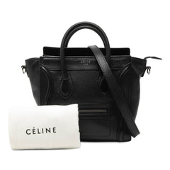 Celine Nano Leather Luggage Tote in beige with top handles, structured design, and subtle logo detail.