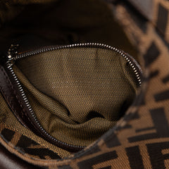 Fendi Zucca canvas shoulder bag with brown and beige geometric print, featuring a leather strap and metal hardware.