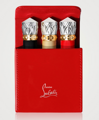 Christian Louboutin On The Go Les Rouges lipstick set featuring three vibrant red lipsticks in sleek packaging.