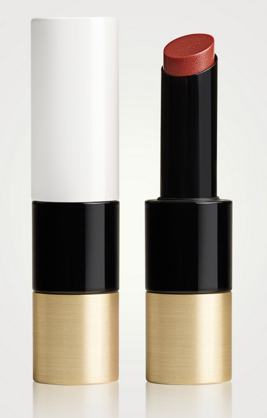 Hermès Silky Lipstick Shine in various shades, featuring a sleek tube and glossy finish, showcasing luxury beauty product.