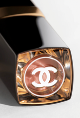 Chanel Rouge Coco Flash lipstick in various shades, new in box, showcasing vibrant color and sleek packaging.