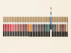 Hermès Trait d'Hermès Colour Eye Pencil in various shades, new in box, with sharpened tips and colorful packaging.