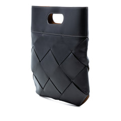 Black Bottega Veneta Small Leather Maxi Intrecciato Slip Tote bag with woven leather design and sleek handles.