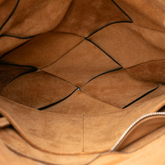 Black Bottega Veneta Small Leather Maxi Intrecciato Slip Tote bag with woven leather design and sleek silhouette.