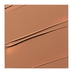 Milk Makeup Matte Bronzer in baked form, showing the smooth, baked powder texture in a natural makeup setting.