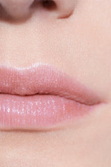 Chanel Rouge Coco Flash lip gloss in various shades, new in box, featuring sleek packaging and vibrant color options.