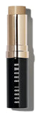 Bobbi Brown Moisturizing Stick Foundation in three shades, new in box, showcasing smooth, portable makeup for glowing skin.