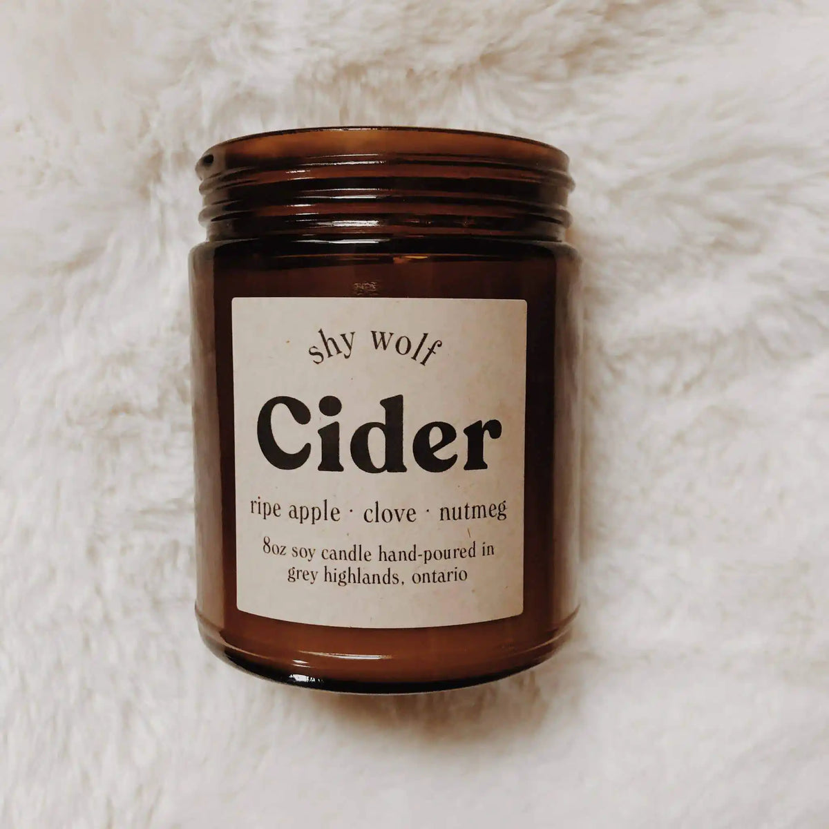 Shy Wolf Candles apple cider soy candle with fall-themed design, perfect for home decor and cozy autumn ambiance.