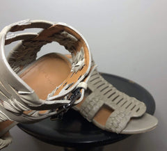 Givenchy taupe leather cage gladiator sandals, size 35, with strappy design and open toe for stylish summer footwear.