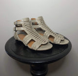 Givenchy taupe leather cage gladiator sandals size 35 with strappy design and open toe style.