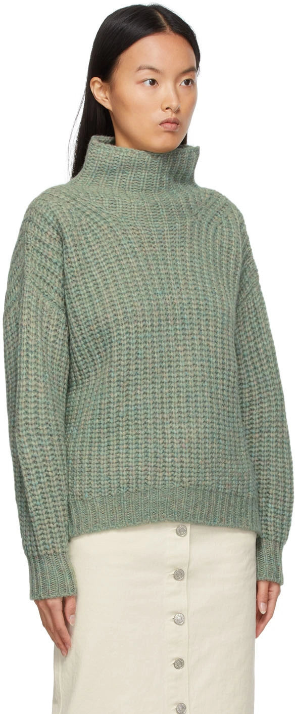 Isabel Marant Iris knit turtleneck sweater in cozy wool, featuring a classic design with a high neckline and textured pattern.