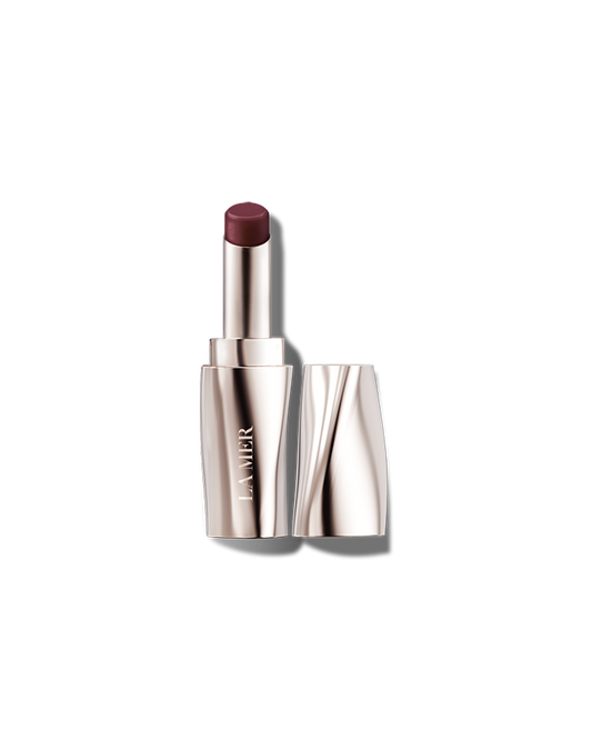 La Mer The Lip Treatment in various shades, new in box, showcasing the sleek packaging and diverse color options.