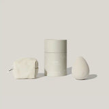 Maude Drop Body Massager, a sleek pleasure device with smooth design, shown in a modern, minimalist setting.