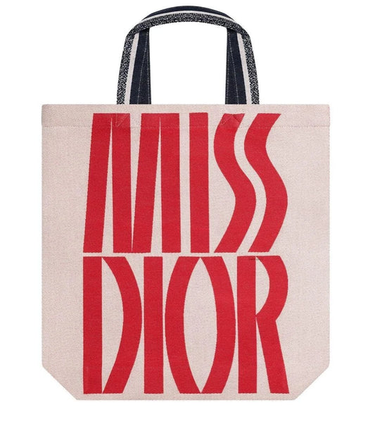 Dior Miss Dior Exhibition Limited Edition tote bag with floral design, featuring leather handles and spacious interior.