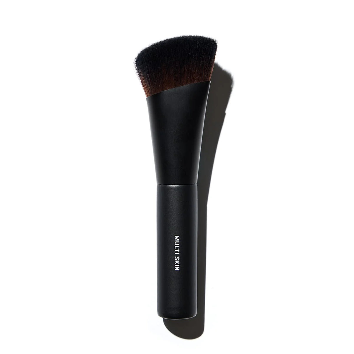 Gee Beauty Multi Skin Brush NIB for beauty skincare, showcasing soft bristles and ergonomic handle for gentle application.