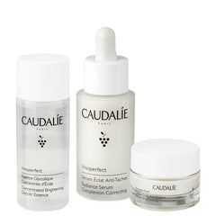 Caudalie Vinoperfect Brightening Solution Set featuring skincare bottles and tubes for radiant skin, displayed on a white background.