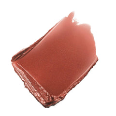 Chanel Rouge Coco Ultra Hydrating Lip Colour in various shades, featuring a close-up of the lipstick bullet on a Paris-themed background.