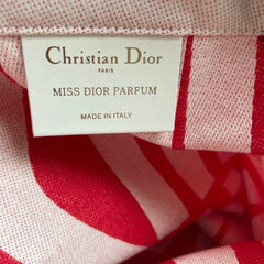 Dior Miss Dior Exhibition Limited Edition tote bag with floral design and structured shape, featuring Dior branding and sturdy handles.