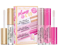 Too Faced Plump & Go Travel Plumping Gloss Set with multiple glosses in sleek packaging, ideal for on-the-go beauty.