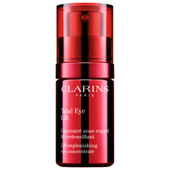 Clarins Total Eye Lift firming and smoothing anti-aging eye cream in a 15ml jar, with a sleek white and gold design.