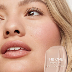 Saie Hydrabeam hydrating under eye brightener in multiple shades, featuring a sleek applicator and smooth, luminous finish.