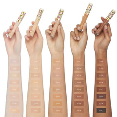 Gucci Concentré de Beauté multi-use concealer in various shades, hydrating and crease-proof, close-up of the sleek product container.