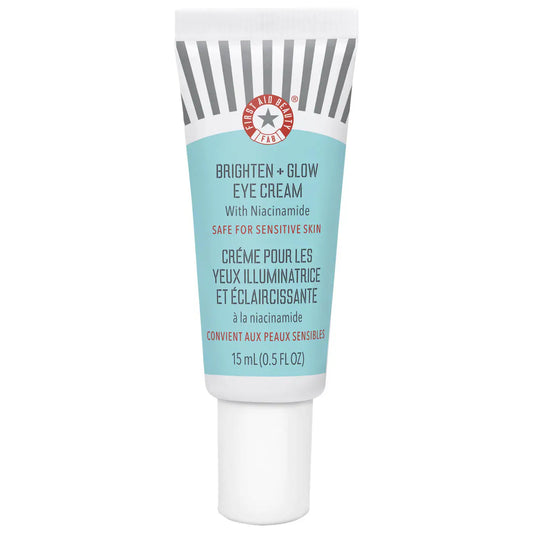 First Aid Beauty Brighten + Glow Eye Cream with Niacinamide in 15ml jar, showcasing the product container and packaging.