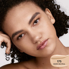 Fenty Beauty Soft’Lit Hydrating Longwear Foundation bottle with shade options, displayed with natural lighting and a clean background.