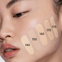 Fenty Beauty Soft’Lit Naturally Luminous Hydrating Longwear Foundation in various shades, packaged in a sealed box.