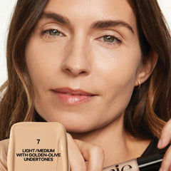Saie Slip Tint Radiant All-Over Concealer in various shades, natural finish, tube packaging, close-up view of the beauty product