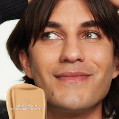 Saie Slip Tint Radiant All-Over Concealer in multiple shades, featuring a sleek tube and applicator for natural skin coverage.