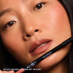 Saie Lip Liner 101 in various shades, creamy and nourishing lip pencil, close-up image showing the product in a sleek black packaging