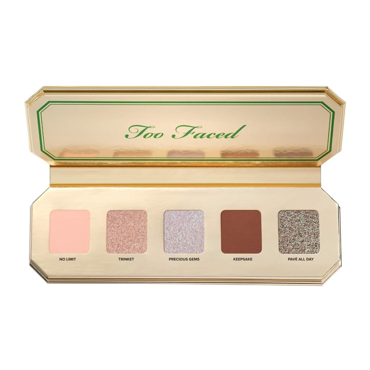 Too Faced Precious Gems eyeshadow palette featuring shimmering jewel-toned eyeshadows in a sleek compact.